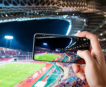 Phone taking picture in stadium